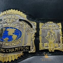 Close-up of the genuine leather strap on the USWA Unified World Title Belt, showcasing its durability.