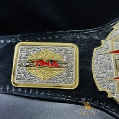 The TNA X Division Championship Belt shown with customization options, ideal for personalizing this iconic title.