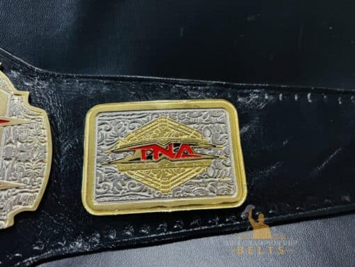 Close-up of the genuine leather strap on the TNA X Division Championship Belt, highlighting its quality and durability.