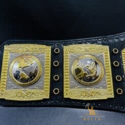 Close-up of the genuine leather strap on the TNA World Heavyweight Championship Belt, highlighting its quality and durability.