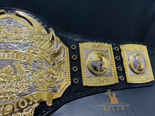 Side profile of the TNA Heavyweight Championship Belt, highlighting its authentic craftsmanship and leather finish.