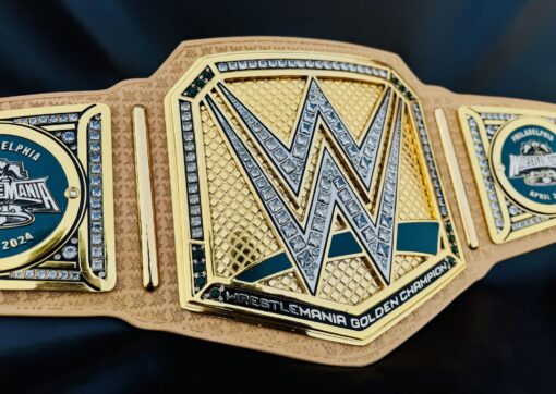 Detailed shot of the sparkling embellishments on the WrestleMania 40 Golden Replica Belt, capturing its brilliance.