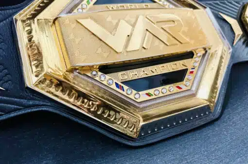 Close-up of the main plate on a custom UFC belt with deep HD engraving.