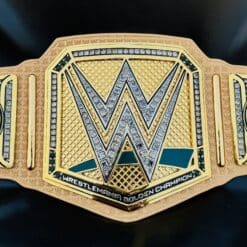 The WrestleMania 40 Golden Championship Belt captured in natural light, accentuating its shine and color.