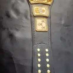 Black leather strap of the Warrant Officer Championship Belt with gold accents.