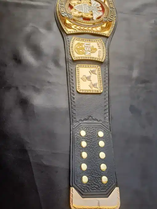 Black leather strap of the Warrant Officer Championship Belt with gold accents.