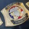 Warrant Officer Championship Belt with eagle emblem and gold plates.