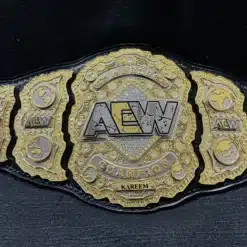 AEW World Title replica featuring shiny gold and chrome-plated details.