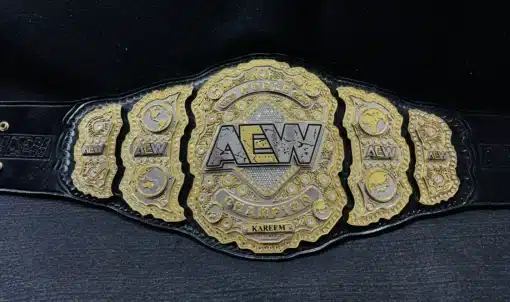 AEW World Title replica featuring shiny gold and chrome-plated details.