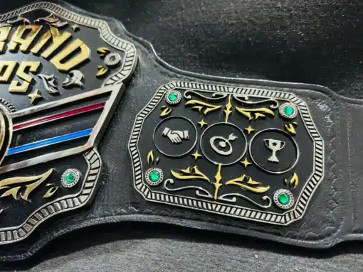 Side plates featuring engraved icons and design details of the Sales Champion Belt.