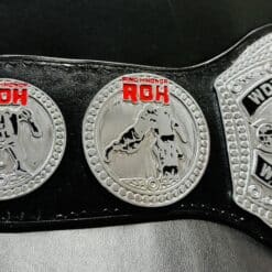 Side view of the new ROH World Championship Belt highlighting multi-layered plates and intricate design.