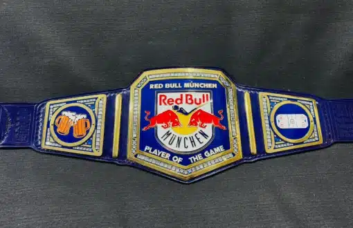 Custom Red Bull München championship belt featuring a TV-accurate WWE-style design with a Red Bull logo centerpiece.