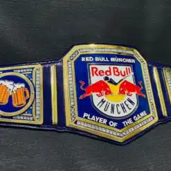 Close-up of the Red Bull logo on the main plate of the custom championship belt with hand-engraved detailing.