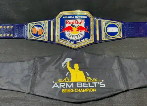 Beer and hockey-themed custom wrestling belt with engraved side plates and Red Bull logo centerpiece.