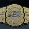 AEW Championship Belt showing HD-engraved plates and genuine leather strap.