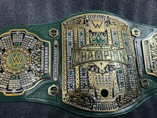 Gold-plated Crown Jewel Championship Belt replica on green leather strap