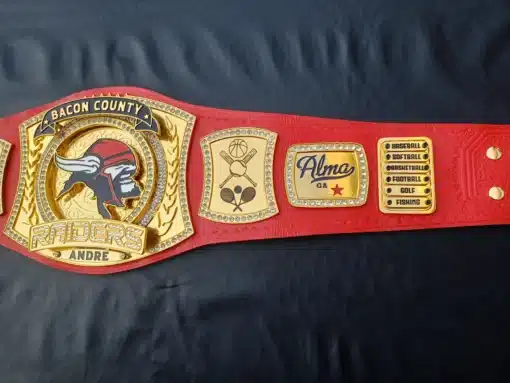 Customizable schools event championship belt with personalized logos, names, and event themes.