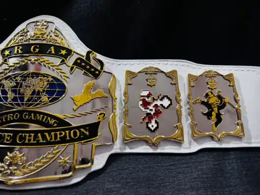 Retro gaming championship belt featuring a luxurious gold-plated finish and deep engraving details.