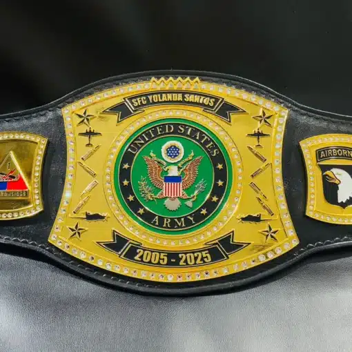 Close-up of the U.S. Army championship belt’s center plate featuring the official Army seal and customizable nameplate.