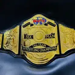 Detailed gold-plated center plate with Six-Man Tag Team Wrestling Champions engraving, featuring a high-quality replica design.