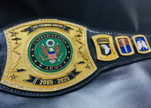 Durable black leather strap with gold-plated rivets on a custom U.S. Army championship belt.