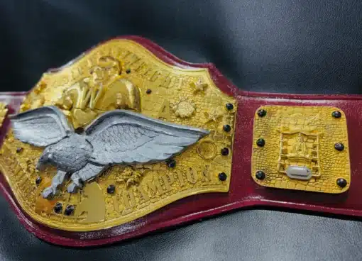 Old-school World Heavyweight Wrestling Championship Belt featuring a historical wrestling design.