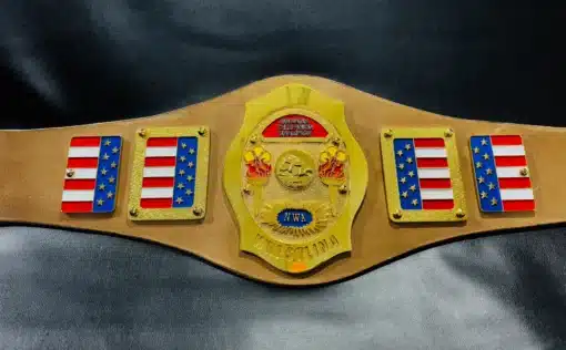 eorgia Television Champion" text, red and blue enamel, torches, and an embossed wrestler design.