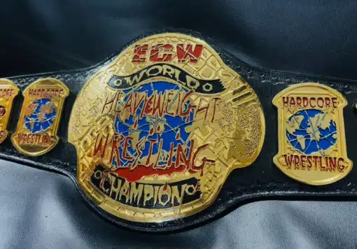 Side-angle view of the ECW Wrestling Championship belt, emphasizing deep etching, gold plating, and premium craftsmanship