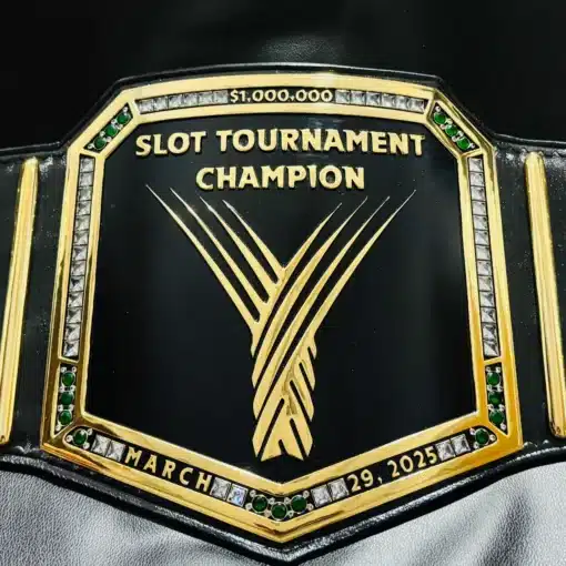 Custom slot tournament championship belt with gold-plated plates and casino theme.