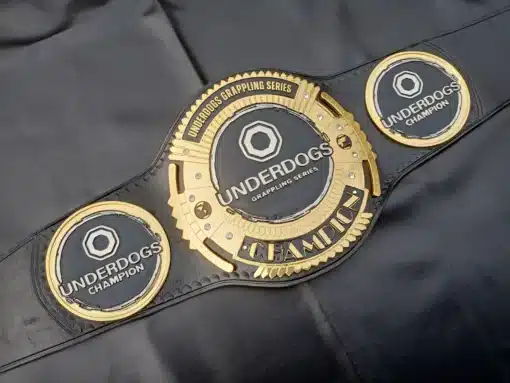 A fully customizable championship belt with a bold "Underdogs Champion" design, perfect for wrestling, MMA, and grappling events.