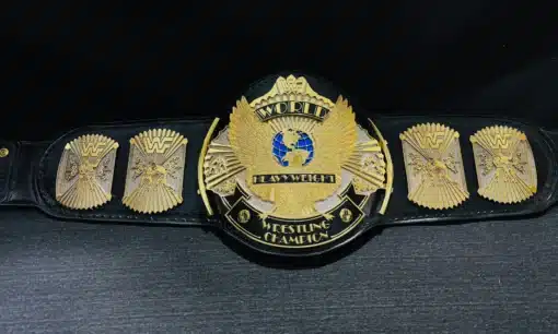 Close-up of the nugget hand-textured detailing on the plates, a unique feature of this WWF Winged Eagle Belt replica.