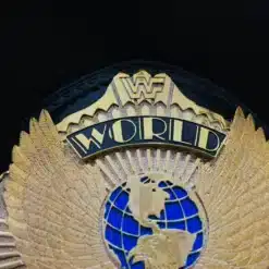 Close-up view showcasing the deep HD engraving on the gold-plated main plate of the Winged Eagle Championship Belt