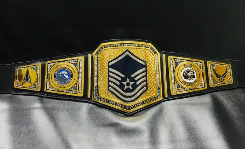 Stunning Air Force belt showcasing detailed engraving, military logos, and a luxurious gold-plated finish.