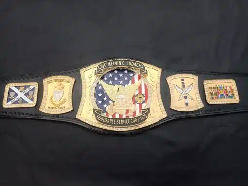 Custom Coast Guard retirement belt with service details, insignia, and engraved nameplate
