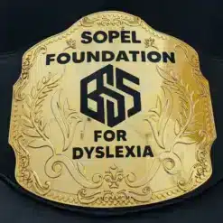 Gold engraved charity award belt on black leather for foundation and nonprofit recognition