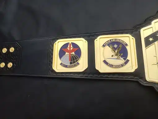 Detailed side plates featuring engraved USAF rescue squadron logos.