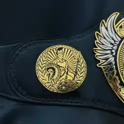 Warrior-themed side plate on MLW replica belt with laurel wreath and classic wrestling style
