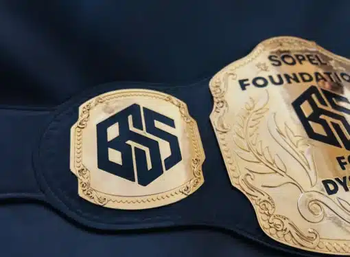 Premium custom award belt with gold engraving for charity, nonprofit, or employee recognition