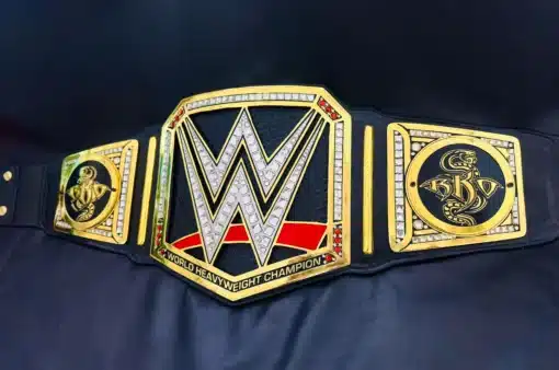 WWE replica belt for collectors featuring RKO logos and detailed etching on genuine leather