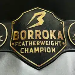 Custom MMA featherweight championship belt for fight leagues and promotions with gold plates and leather strap.