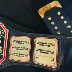 Law firm award belt featuring engraved brass plates and scales of justice design for recognizing big wins.