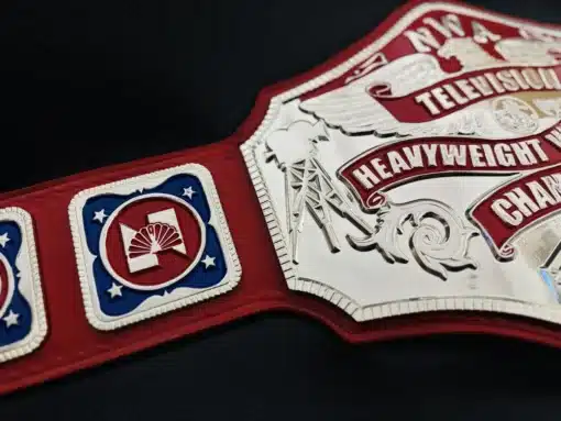 Zoomed-in view of left strap with snap buttons and embossed leather finish.