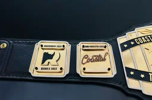 Custom fantasy football belt with engraved side plates and winner names