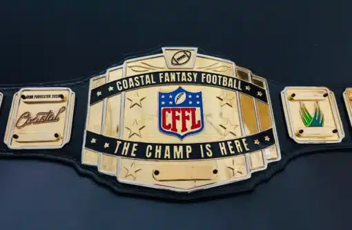 Close-up of custom CFFL football belt with black and gold finish