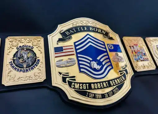 Military retirement belt with engraved nameplate and USAF service dates from 1998 to 2025