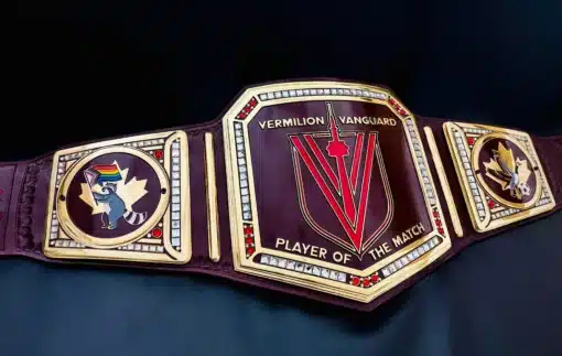 High-quality supporter belt held at stadium by female fan, featuring red leather and gold plates – custom belt for soccer fans.