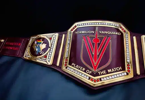 Fan showing off exclusive championship belt for AFC Toronto’s Player of the Match – handcrafted belt with supporter design.