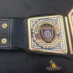 Detailed side plate engraving with Harlingen PD crest and crystal gem accents on custom trophy belt for law enforcement