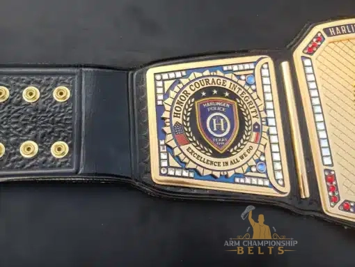 Detailed side plate engraving with Harlingen PD crest and crystal gem accents on custom trophy belt for law enforcement