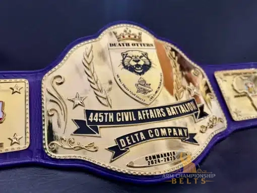 Close-up of engraved military commander belt with 445th Civil Affairs Battalion and Delta Company text